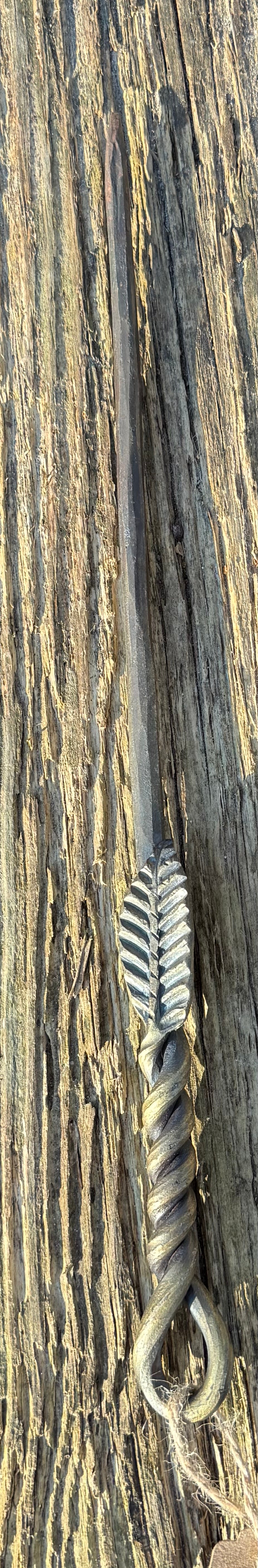 Hand forged iron wand