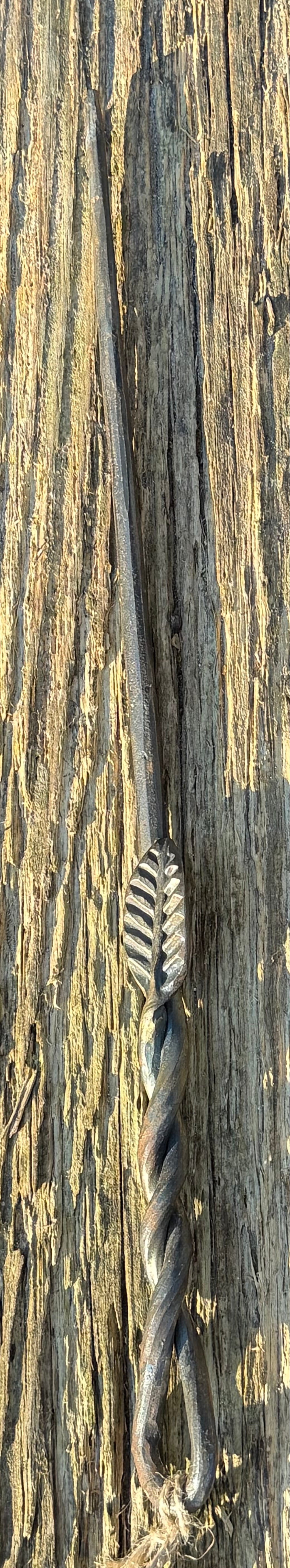 Hand forged iron wand