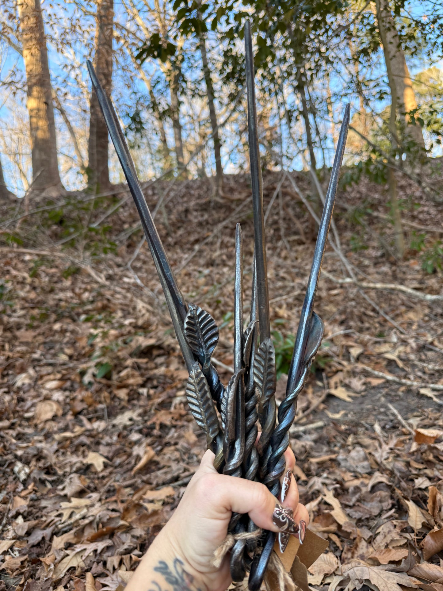 Hand forged iron wand